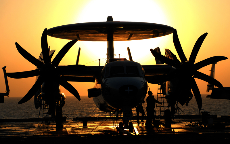 E-2C/D Hawkeye... the eight curved blades replaced the previous four straight propellers... these are quieter, more efficient, and most important cause much lower vibration levels... thus helps the sensitive avionics perform and last longer.